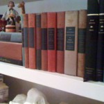A shelf with many books on it